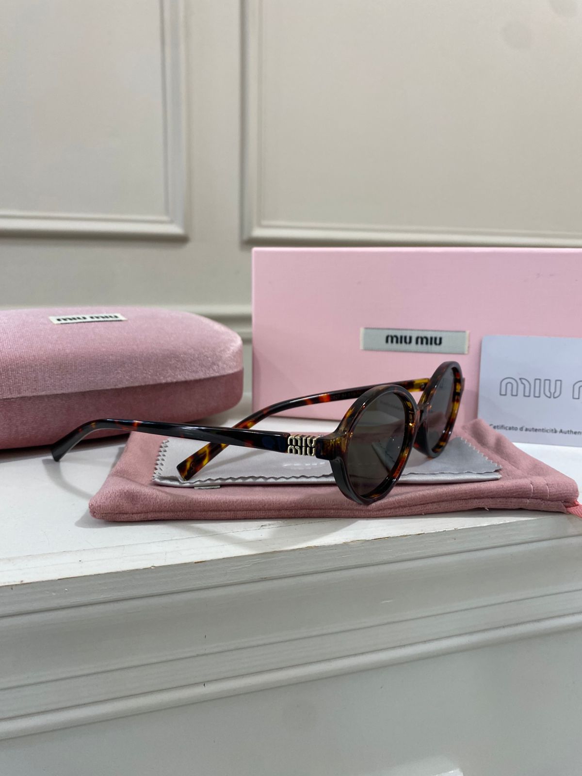 Lentes Miu Miu – Redondo pasta carey verde