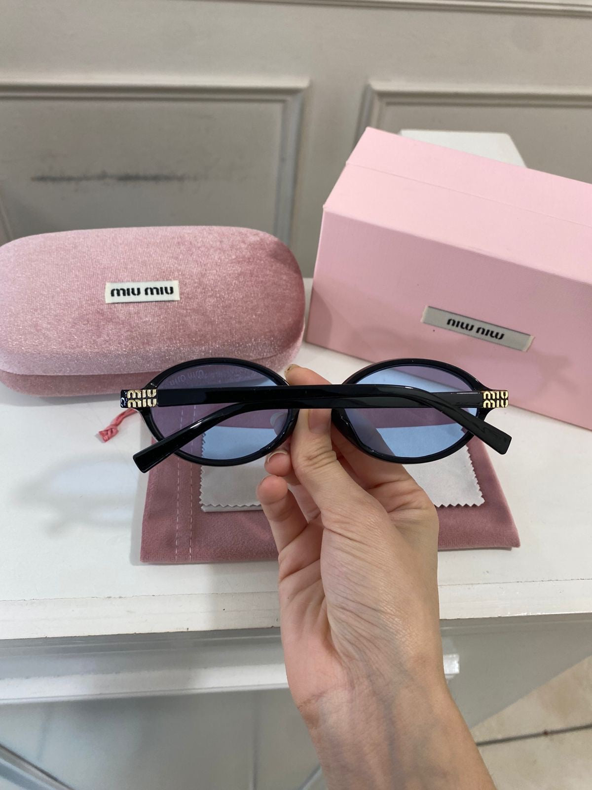 Lentes Miu Miu – Redondo pasta Negro azul