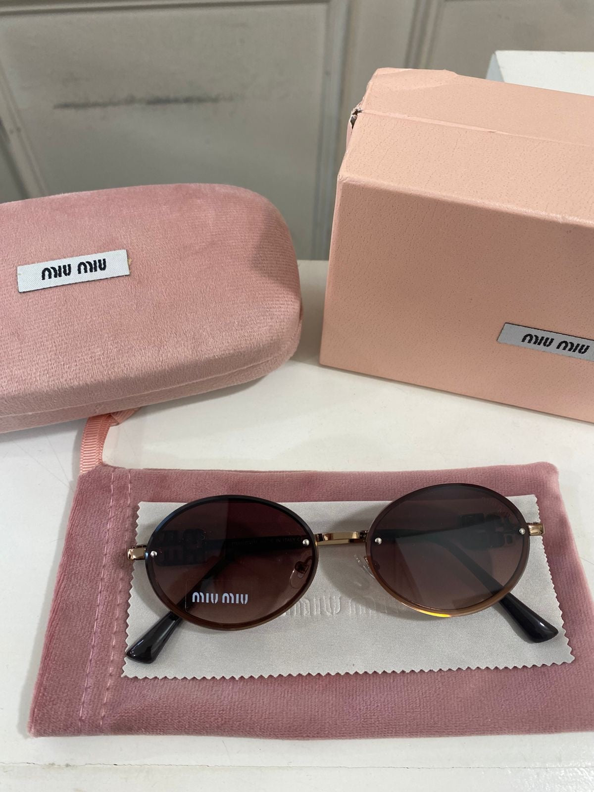 Lentes Miu Miu – Modelo Ovalado metal Cafe
