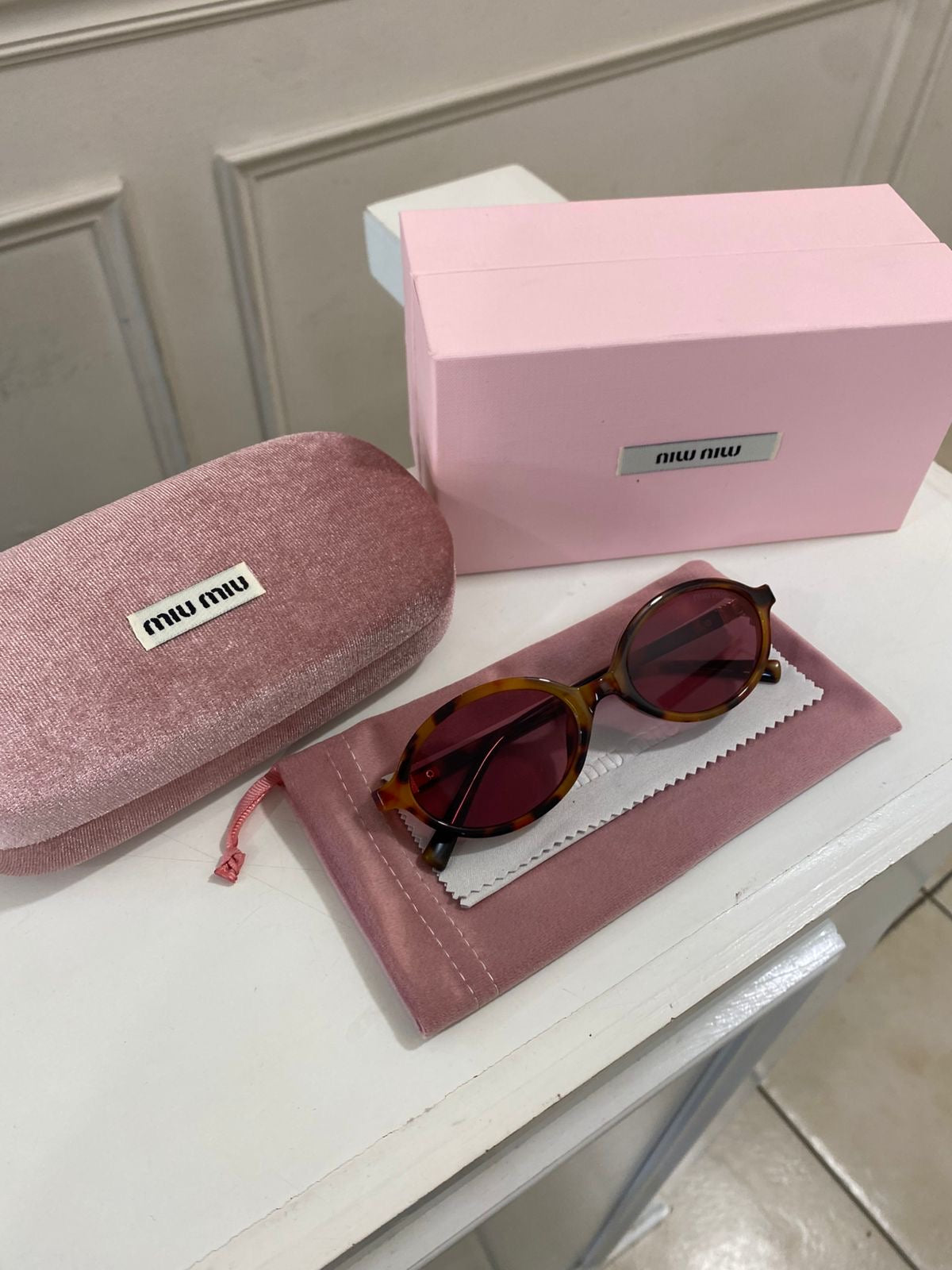 Lentes Miu Miu – Redondo pasta café Rosa