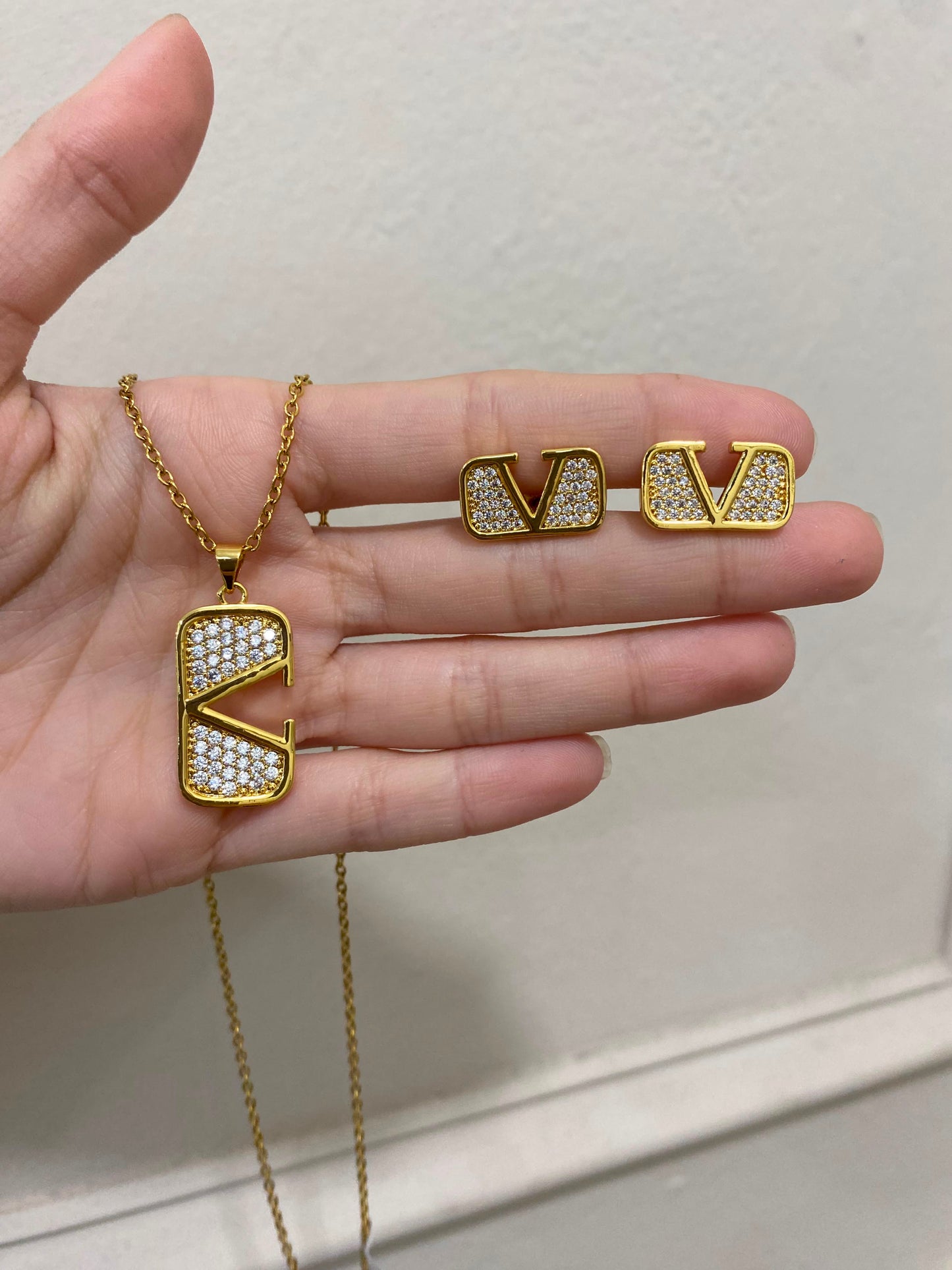 Set Valentino oro piedras