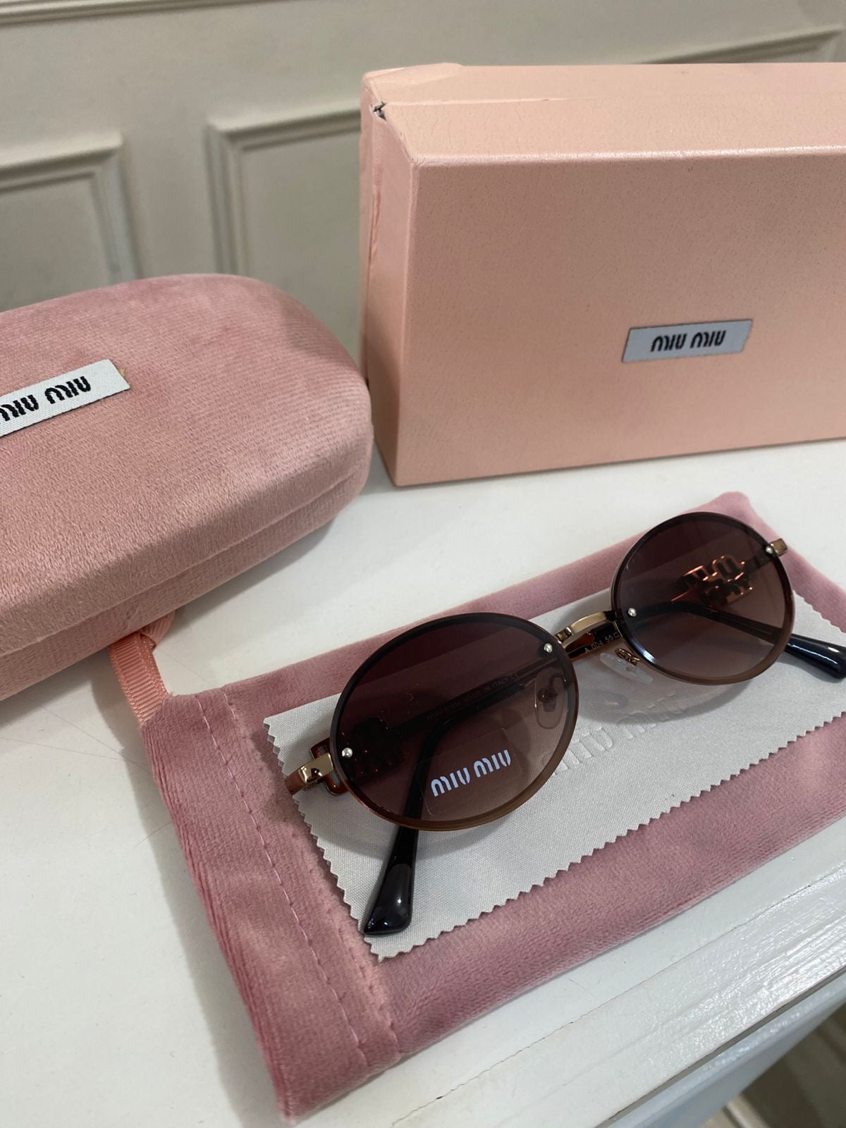 Lentes Miu Miu – Modelo Ovalado metal cobre