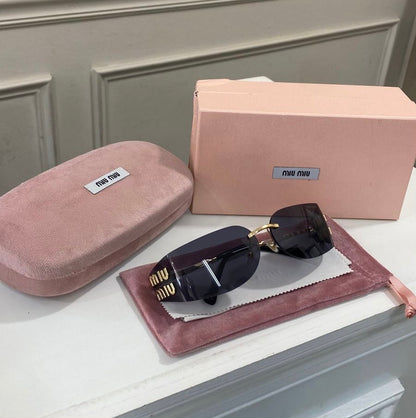 Lentes Miu Miu – curvo oscuro