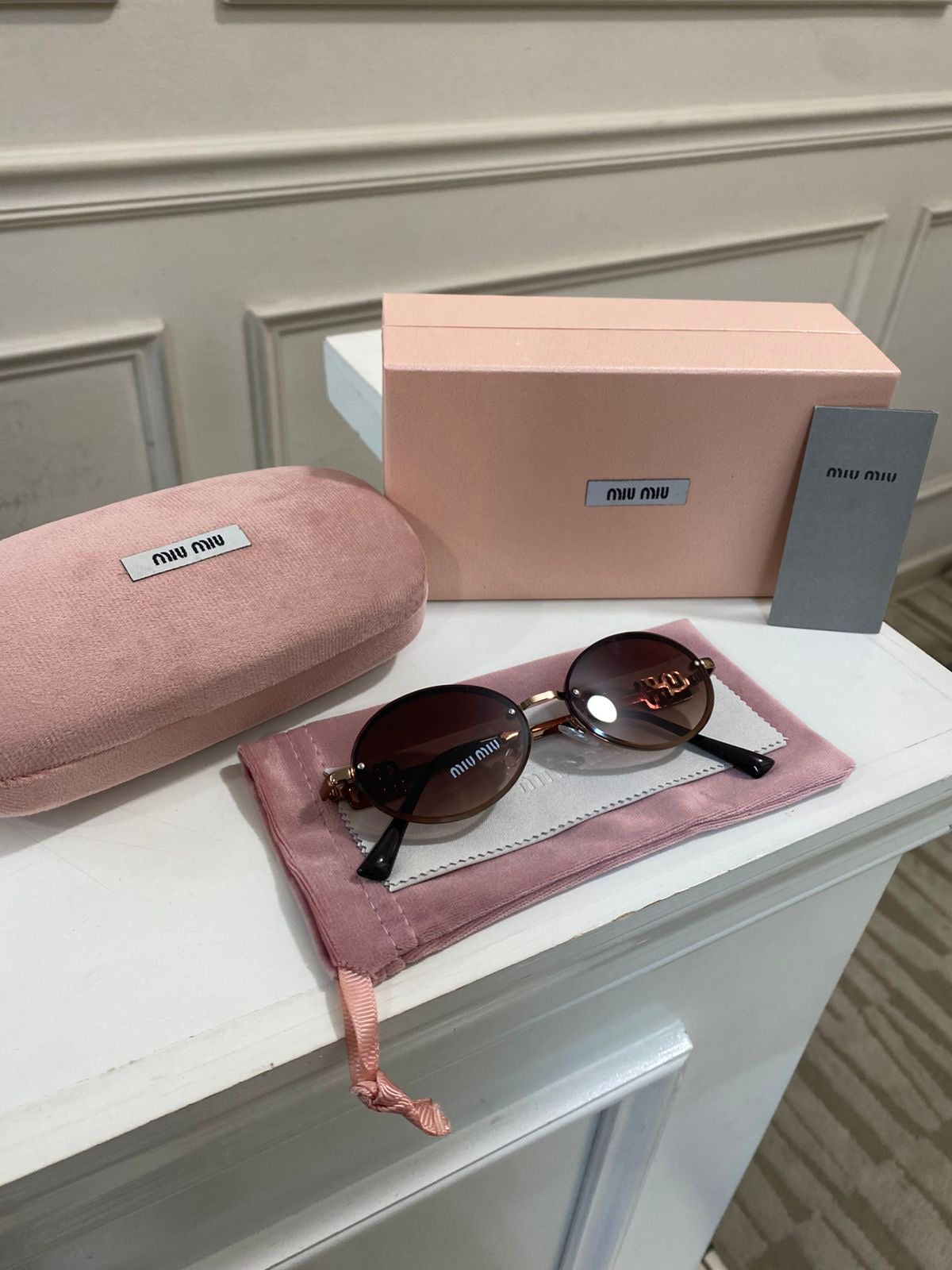 Lentes Miu Miu – Modelo Ovalado metal cobre