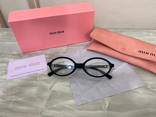 Lentes Miu Miu - Miu Miu Redondo pasta Negro óptico