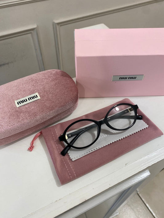Lentes Miu Miu – Redondo pasta negro brillante óptico