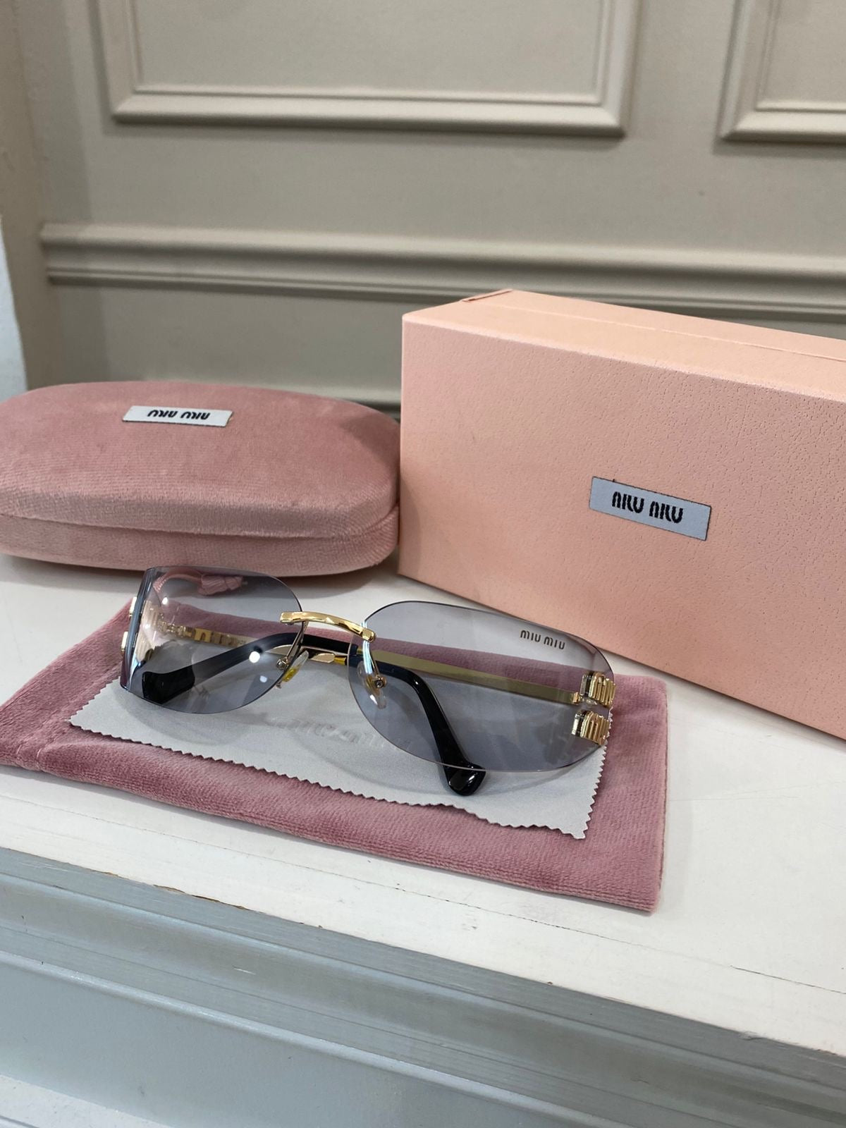 Lentes Miu Miu – curvo claro