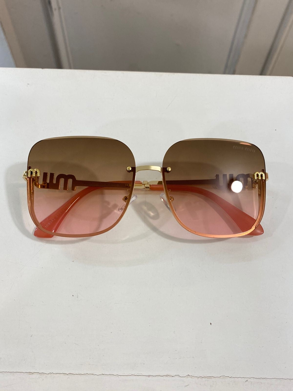 Lentes Miu Miu - Modelo rosado piedras
