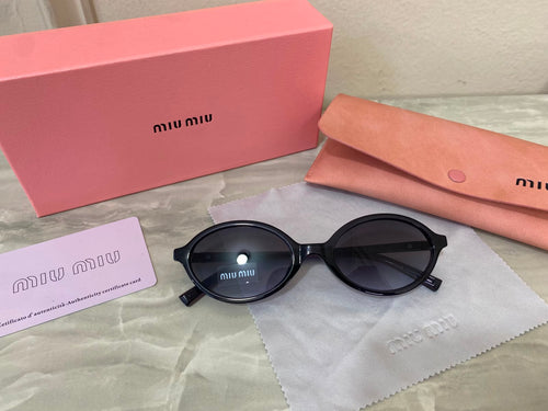 Lentes Miu Miu - Miu Miu Redondo pasta Gris