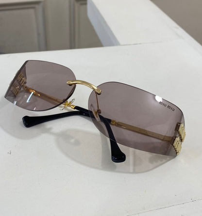 Lentes Miu Miu – curvo rosado