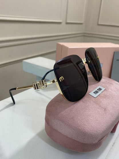 Lentes Miu Miu - Modelo negro oro piedras