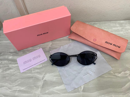 Lentes Miu Miu - Miu Miu Golden Darck