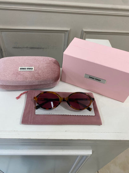 Lentes Miu Miu – Redondo pasta café Rosa