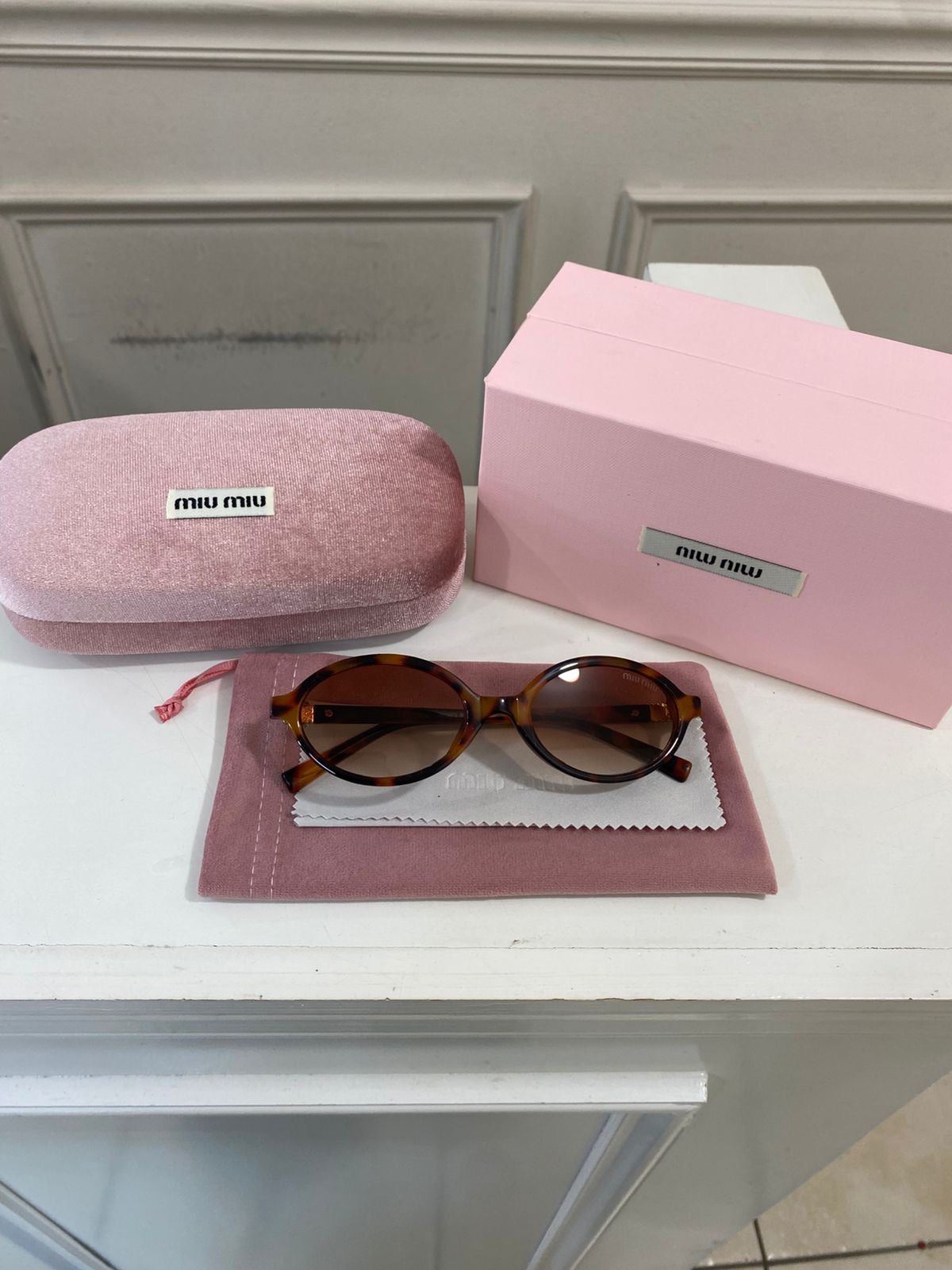 Lentes Miu Miu – Redondo pasta café café