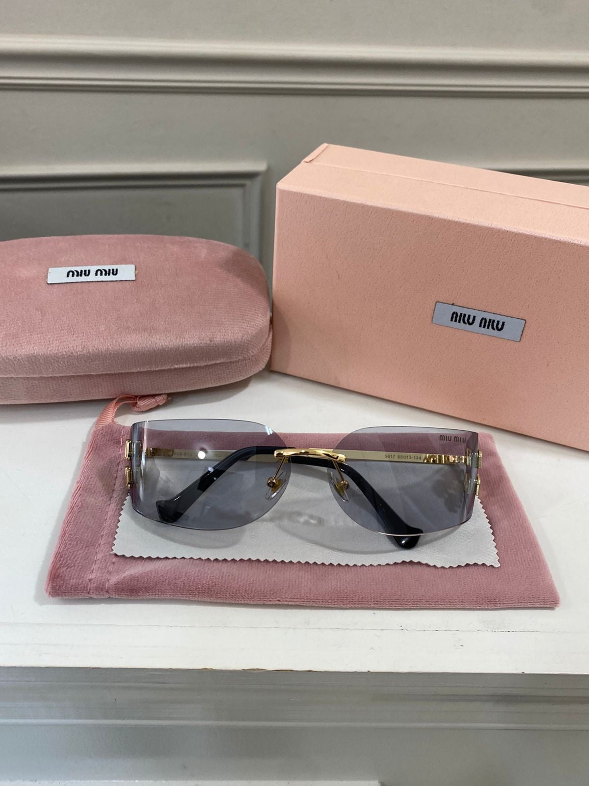 Lentes Miu Miu – curvo claro