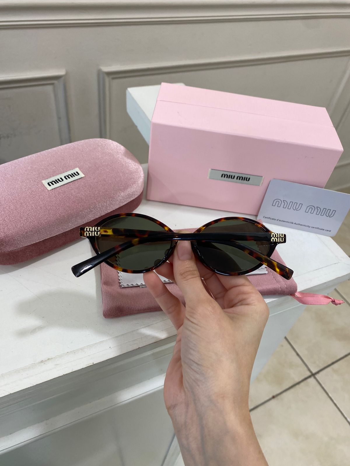 Lentes Miu Miu – Redondo pasta carey verde