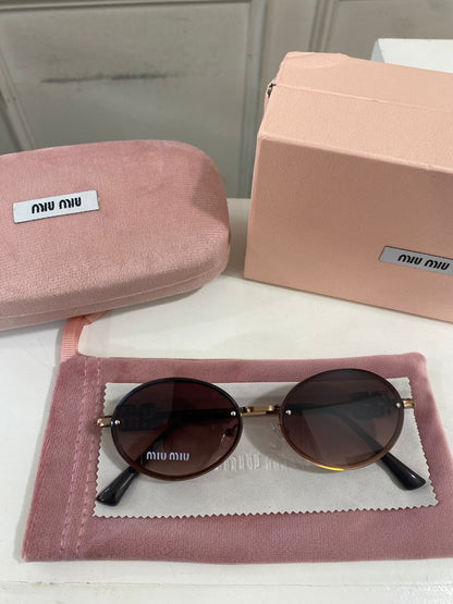 Lentes Miu Miu – Modelo Ovalado metal Cafe