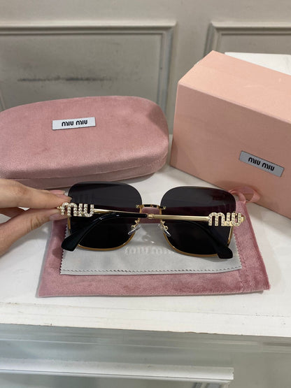 Lentes Miu Miu - Modelo negro oro piedras