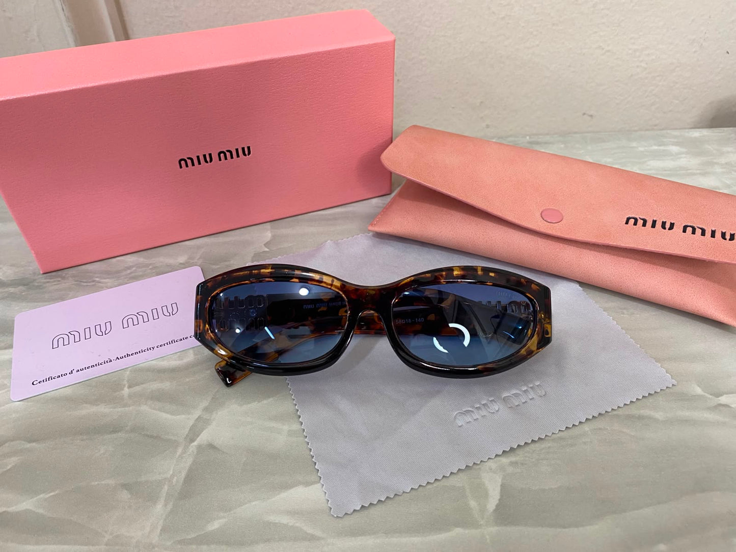Lentes Miu Miu - Miu Miu sunset Blue