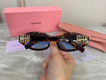 Lentes Miu Miu - Miu Miu sunset Blue
