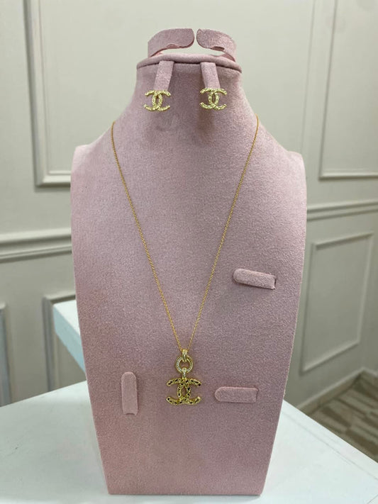Set Chanel marcado oro 2 piezas