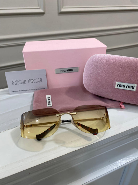 Lentes Miu Miu – curvo amarillo