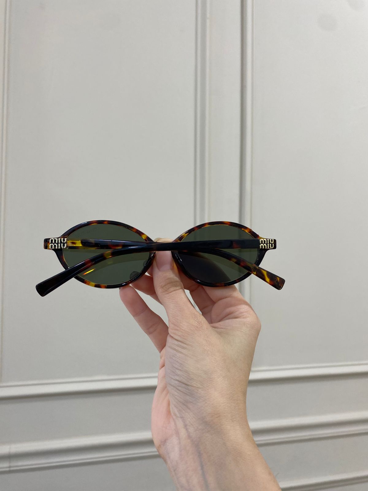 Lentes Miu Miu – Redondo pasta carey verde
