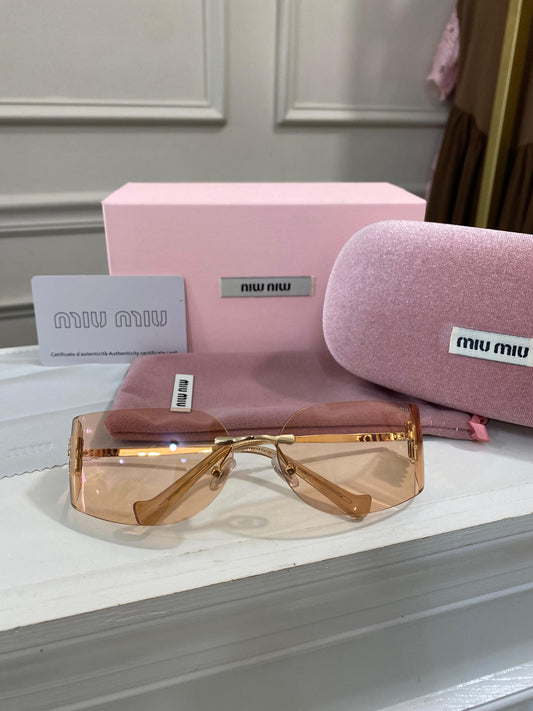 Lentes Miu Miu – curvo coral tornasol