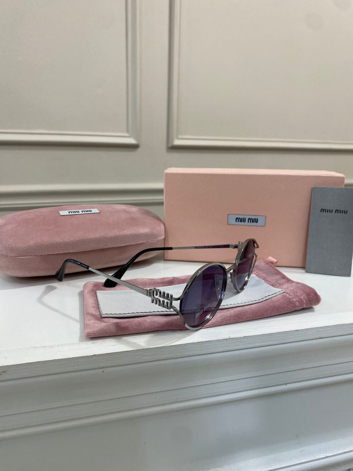 Lentes Miu Miu – Modelo gris plata