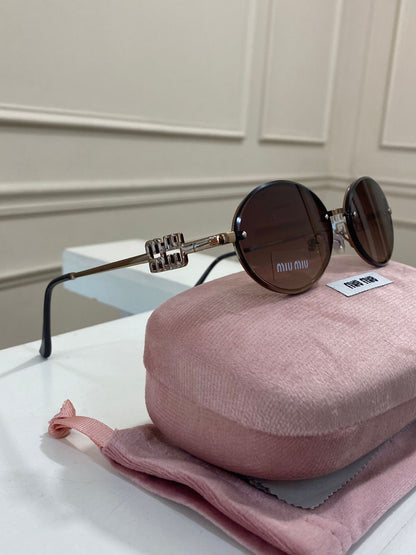 Lentes Miu Miu – Modelo Ovalado metal cobre