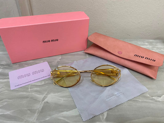 Lentes Miu Miu - Miu Miu Golden Glow yellow