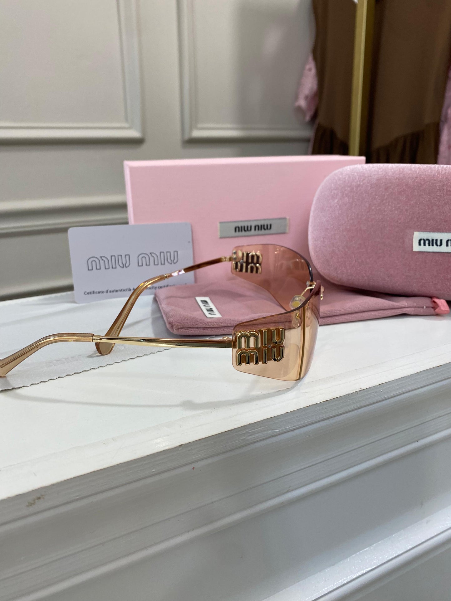Lentes Miu Miu – curvo coral tornasol