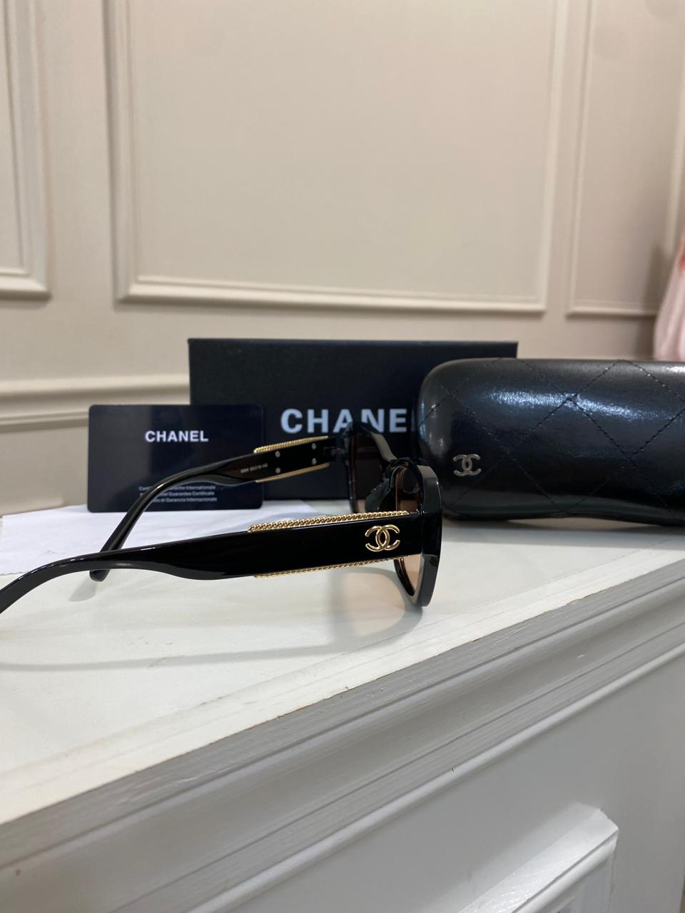 Lentes Chanel - Negro Dorado mica naranja
