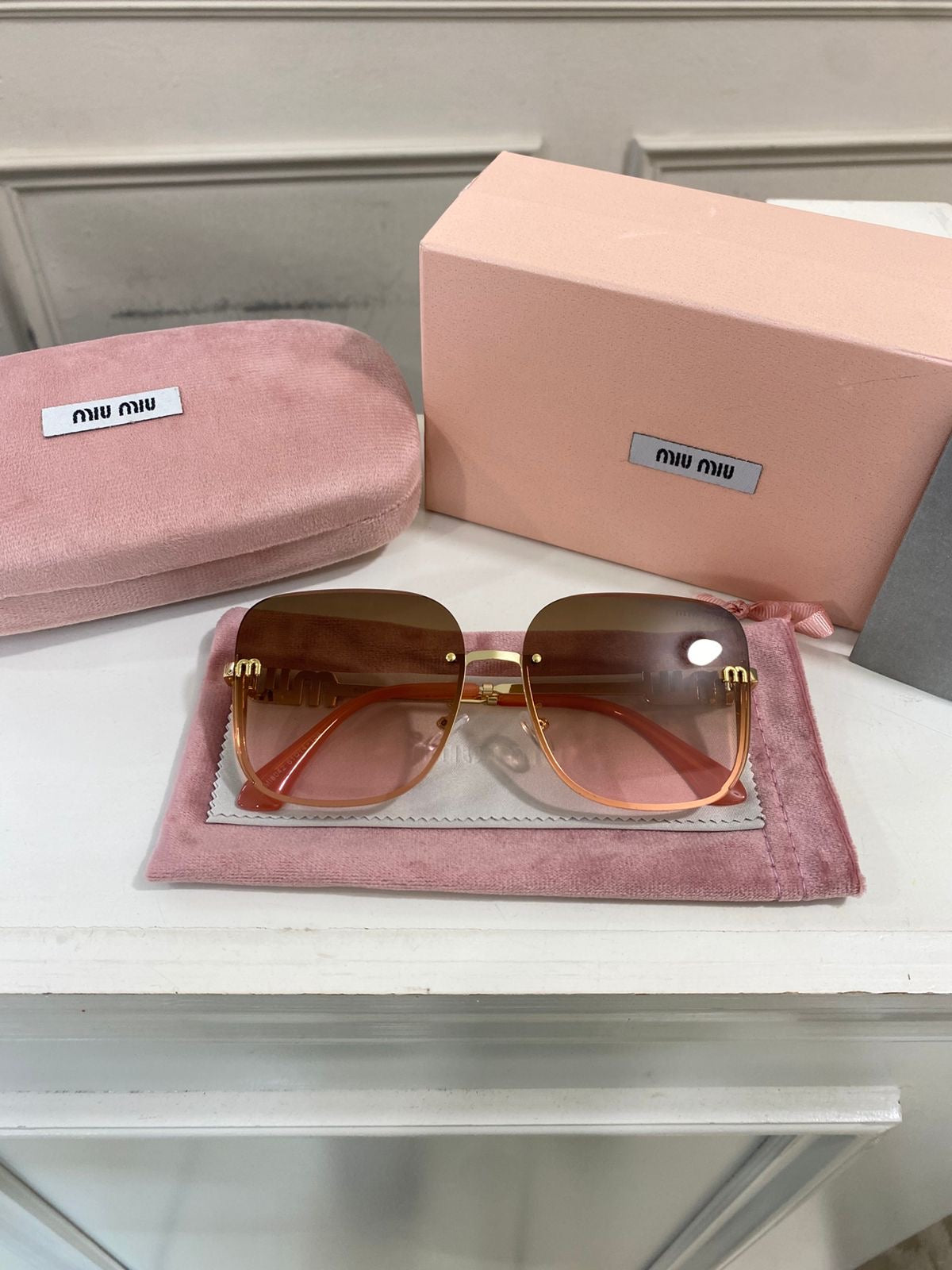 Lentes Miu Miu - Modelo rosado piedras
