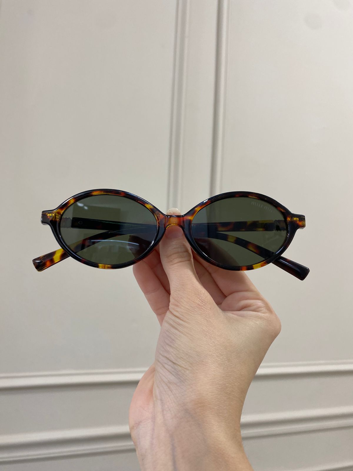 Lentes Miu Miu – Redondo pasta carey verde