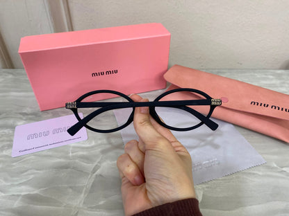 Lentes Miu Miu - Miu Miu Redondo pasta Negro óptico