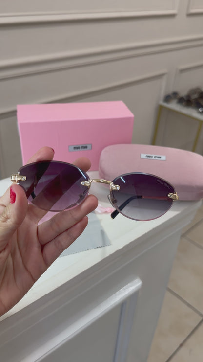 Lentes Miu Miu - MU A54S 5AK04O negro oro