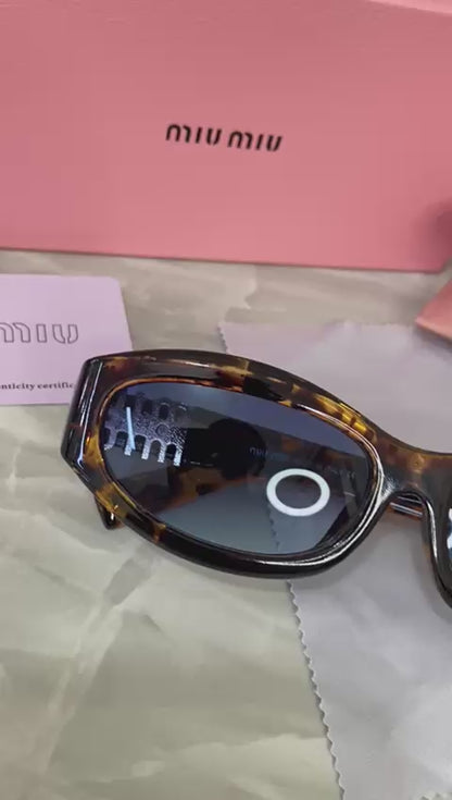Lentes Miu Miu - Miu Miu sunset Blue