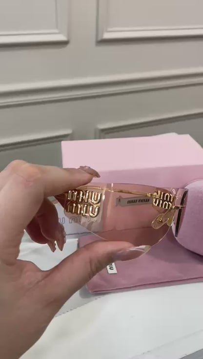 Lentes Miu Miu – curvo coral tornasol