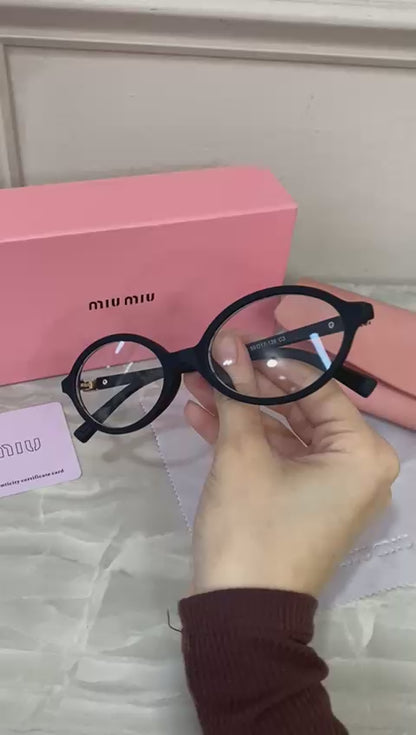 Lentes Miu Miu - Miu Miu Redondo pasta Negro óptico